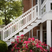 Sunroom stairs from the exterior of a house.