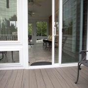 Deck adjoining sunroom.