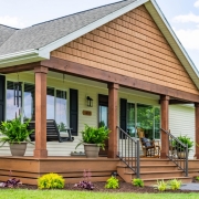 Wide shot of the front of a house in Grottoes, Virginia with a new front porch.